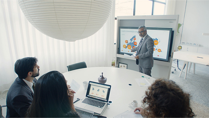 Business meeting with collaboration board